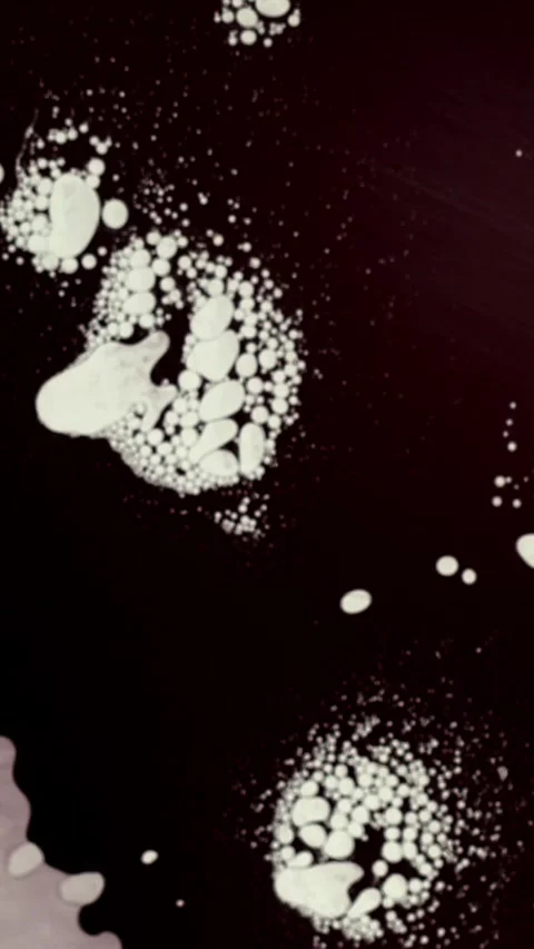 Abstract patterns created by bubbles and shapes on a dark background Stock Footage 341273302