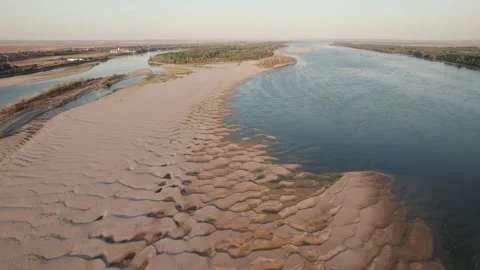 Abstract patterns of the exposed Danube riverbed during extremely low water Vídeos de archivo 342751287