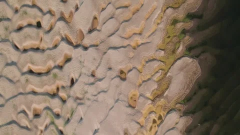 Abstract patterns of the exposed Danube riverbed during extremely low water Vídeos de archivo 342751306