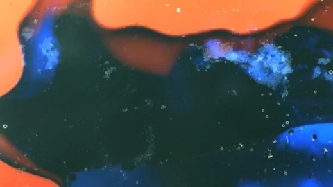 Abstract patterns of ink on water Stock Footage 124718053