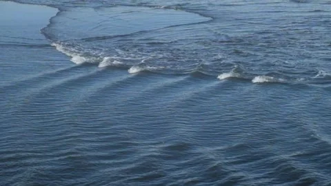 Abstract patterns, shapes and textures of sea wave movements on beach sand Stock-Footage 291468534