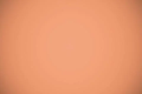 Abstract peach-orange gradient is displaying circular vignette effect in flat Stock Photos