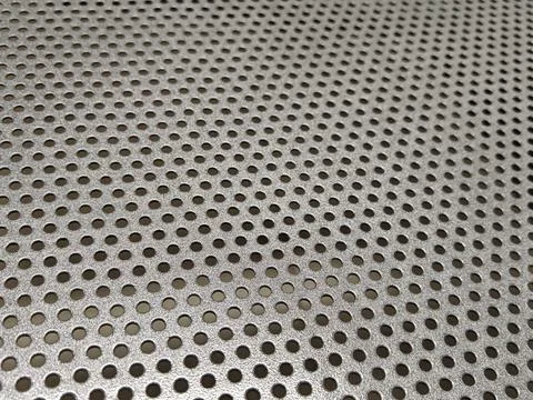 Abstract perforated metal texture with diagonal industrial pattern Stock Photos