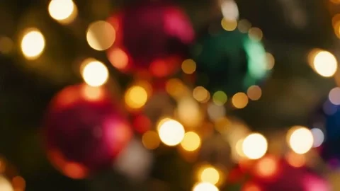Abstract photograph (bokeh) capturing the warm, magical glow of holiday lights Stock Footage 322159501