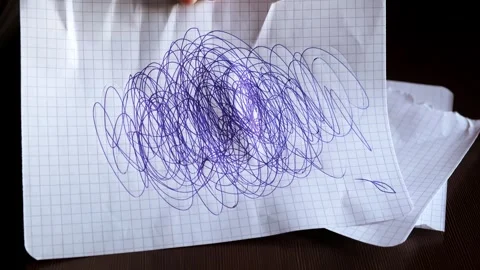 Abstract picture of scribble with pen over a piece of paper in close-up on a Video stock 321861412