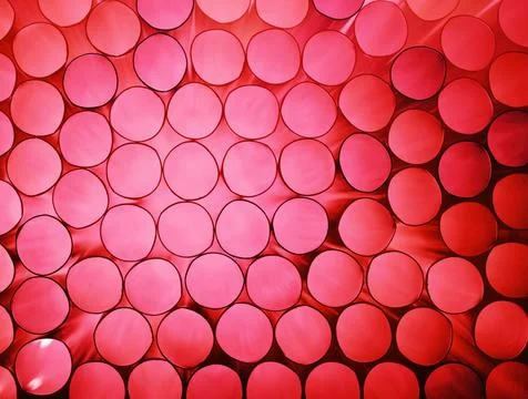 Abstract pink colorful background of stack pipes Abstract coral color tone... Foto stock