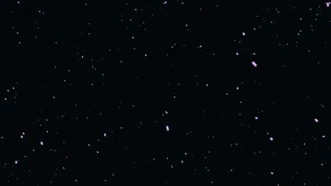 Abstract pink light particles floating slowly down against solid dark void cl Stock Footage 327516635