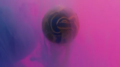 Abstract planet veiled by colors Stock Footage 100020654