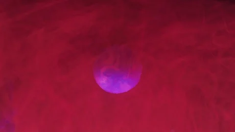 Abstract planet veiled by a purple cloud Stock Footage 100020860