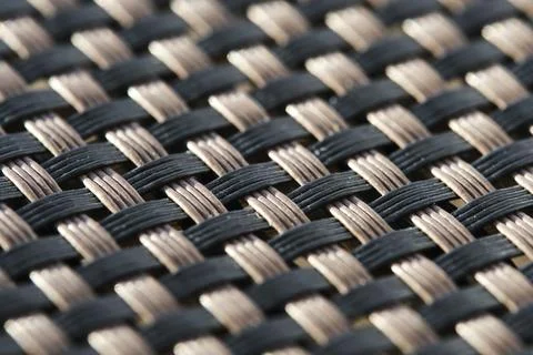 Abstract plastic braided background in close-up. Stock Photos