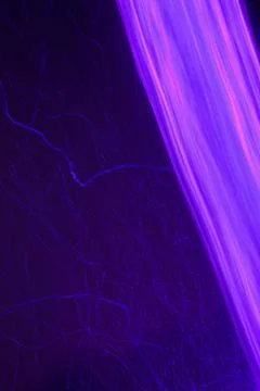 Abstract play light violet filter - sparks on the dark Stock Photos