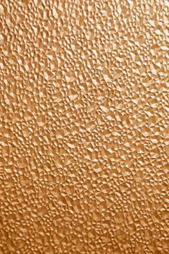 Abstract polygonal pattern on a brown plastic window on the lumen Stock Photos