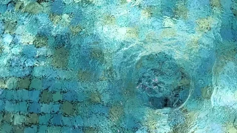 Abstract Pool Water Swirl Created by Underwater Bubbling Jet Stock Footage 337696791