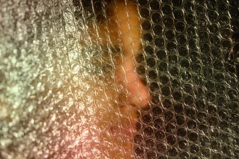 Abstract Portrait Behind Bubble Wrap Stock Photos