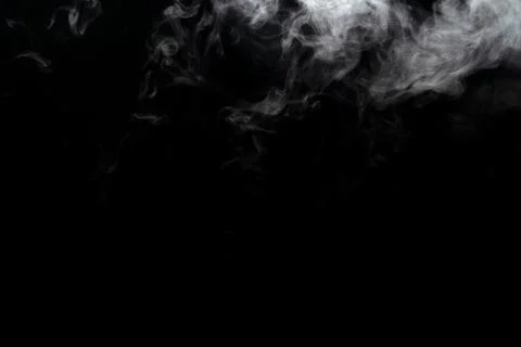 Abstract powder or smoke effect isolated on black background Stock Photos