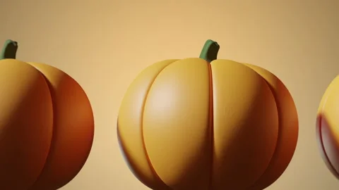 Abstract pumpkin moving on light beige background. Fall season 스톡 동영상 163987672