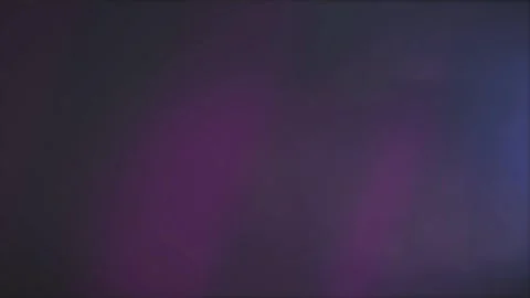 Abstract purple background with soft pink light beams and blue shimmer. Видео 334563020