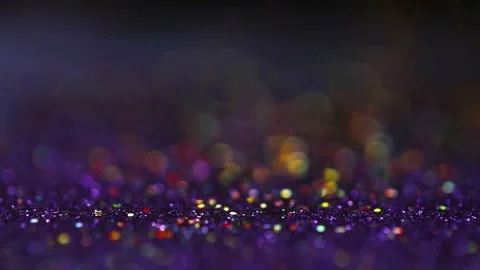 Abstract purple glitter falling on shiny surface. Stock Footage 336812953