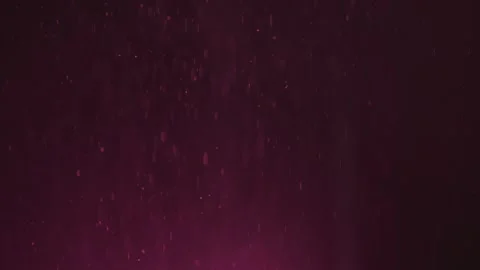 Abstract purple particles floating in slow motion against dark gradient bac.. Stock Footage 337539185