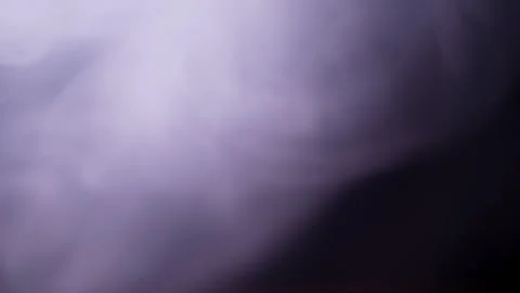 Abstract Purple Smoke Cloud Billowing Slowly on a Black Background Stock Footage 330115356