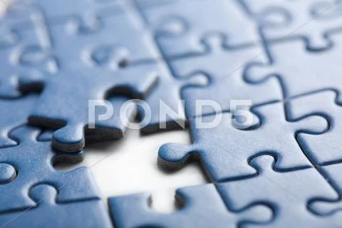Abstract puzzle background with one piece missing Stock-Fotos