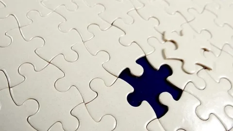 Abstract puzzles stacked on background putting down one piece. Finishing, Video stock 336248337