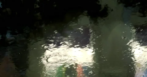 Abstract rain drop flowing in front on window storm evening with chill jazz vibe Stock-Footage 172164065