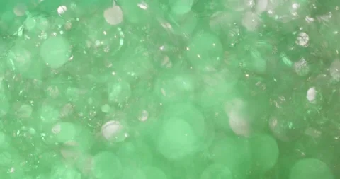 Abstract rainbow bubbles floating with sparkling light effects Stock Footage 329283741