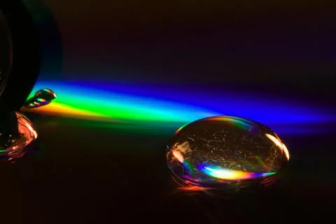 Abstract rainbow drop in a plastic cd Stock Photos