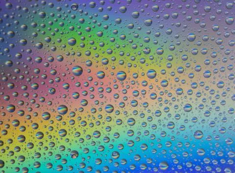 Abstract rainbow drops background Stock Photos