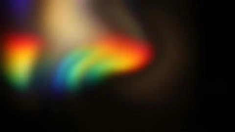 Abstract rainbow light leak, soft blurred prism colors on black background Stock Illustration
