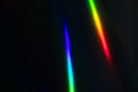 Abstract Rainbow Light Leaks on Dark Background - Vibrant Spectrum in Motion Foto stock