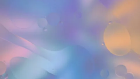 Abstract Rainbow Liquid Gradient with Floating Oil Bubbles Loop Stock Footage 334132148