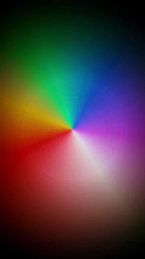 Abstract rainbow spectrum wheel rotating with vibrant color gradients. Video stock 344709220