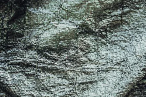 Abstract real fabric surface background. Aluminum Platinum Silver foil Tarpaulin Stock Photos