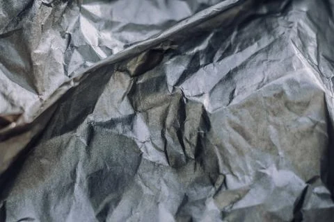 Abstract real paper surface background. Aluminum Platinum Silver foil. Wrinkled Stock Photos