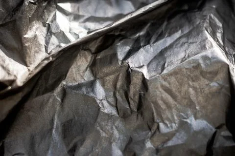 Abstract real paper surface background. Aluminum Platinum Silver foil. Wrinkled Stock Photos