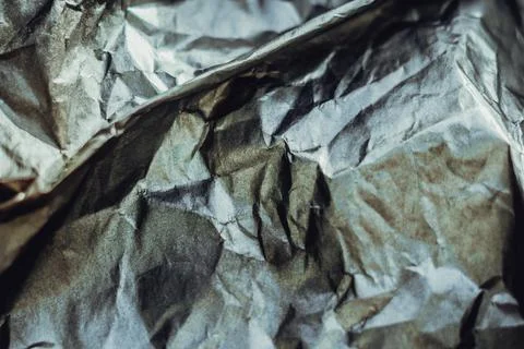 Abstract real paper surface background. Aluminum Platinum Silver foil. Wrinkled Foto stock