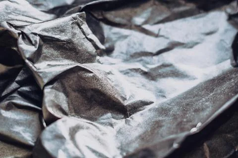 Abstract real paper surface background. Aluminum Platinum Silver foil. Wrinkled Stock Photos