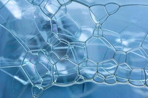 Abstract rectangular shaped soap bubbles in plastic bottle macro close up fro 스톡 사진