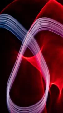 Abstract red and blue lines on a black background Stock Illustration