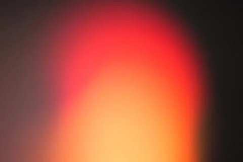 Abstract Red and Orange Light Leak Textures on Black Background 스톡 사진