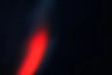 Abstract Red and Orange Light Leak Textures on Black Background 스톡 사진