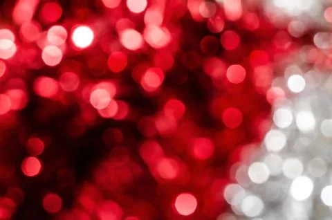 Abstract red and silver circle christmas lights as background. Stock Photos