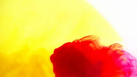 Abstract red and yellow ink reacting together Stock Footage 88069724
