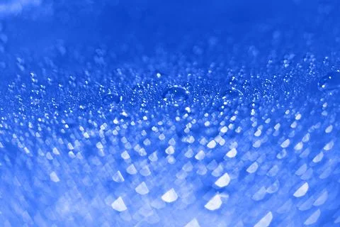 Abstract red background with bokeh and drops of water Stock Photos