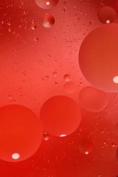 Abstract red background with bubbles in the water Stock Photos