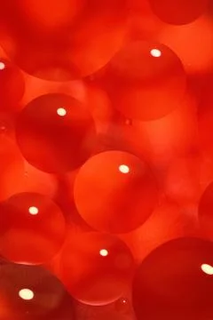 Abstract red background with bubbles in the water Stock Photos