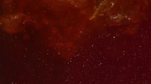 Abstract Red Background Clouds of Gold Glitter Stock Footage 72630029