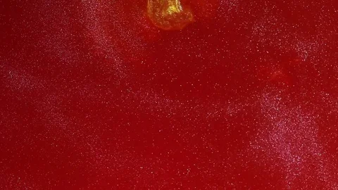 Abstract Red Background Clouds of Gold Glitter Stock Footage 72630121